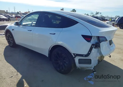 2023 Tesla Model Y Awd/Long Range Dual Motor All-Wheel Drive z USA, uszkodzony, nr VIN 7SAYGDEE2PA051411